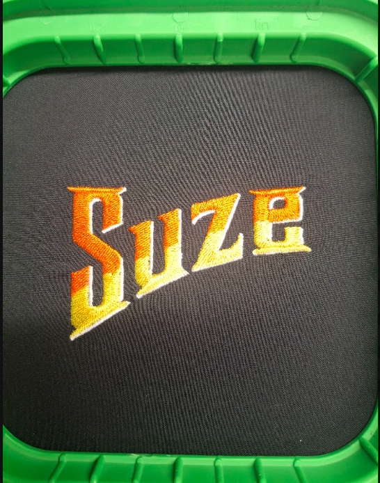 Broderie logo SUZE Broderie logo SUZE